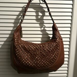 Vintage Cole HAAN Leather Meshed Hobo with inside zipped and two slip pockets.